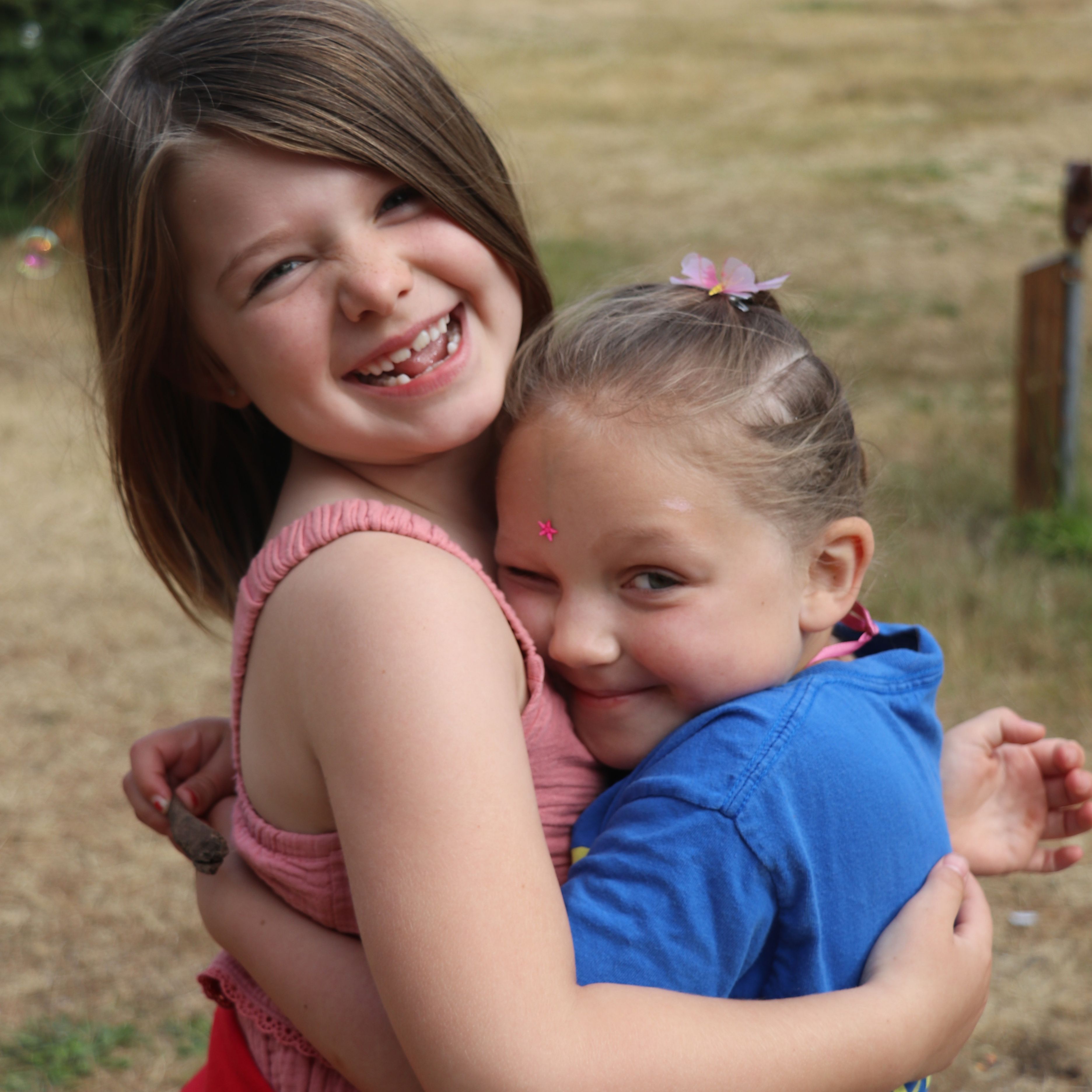 Two girls hugging 