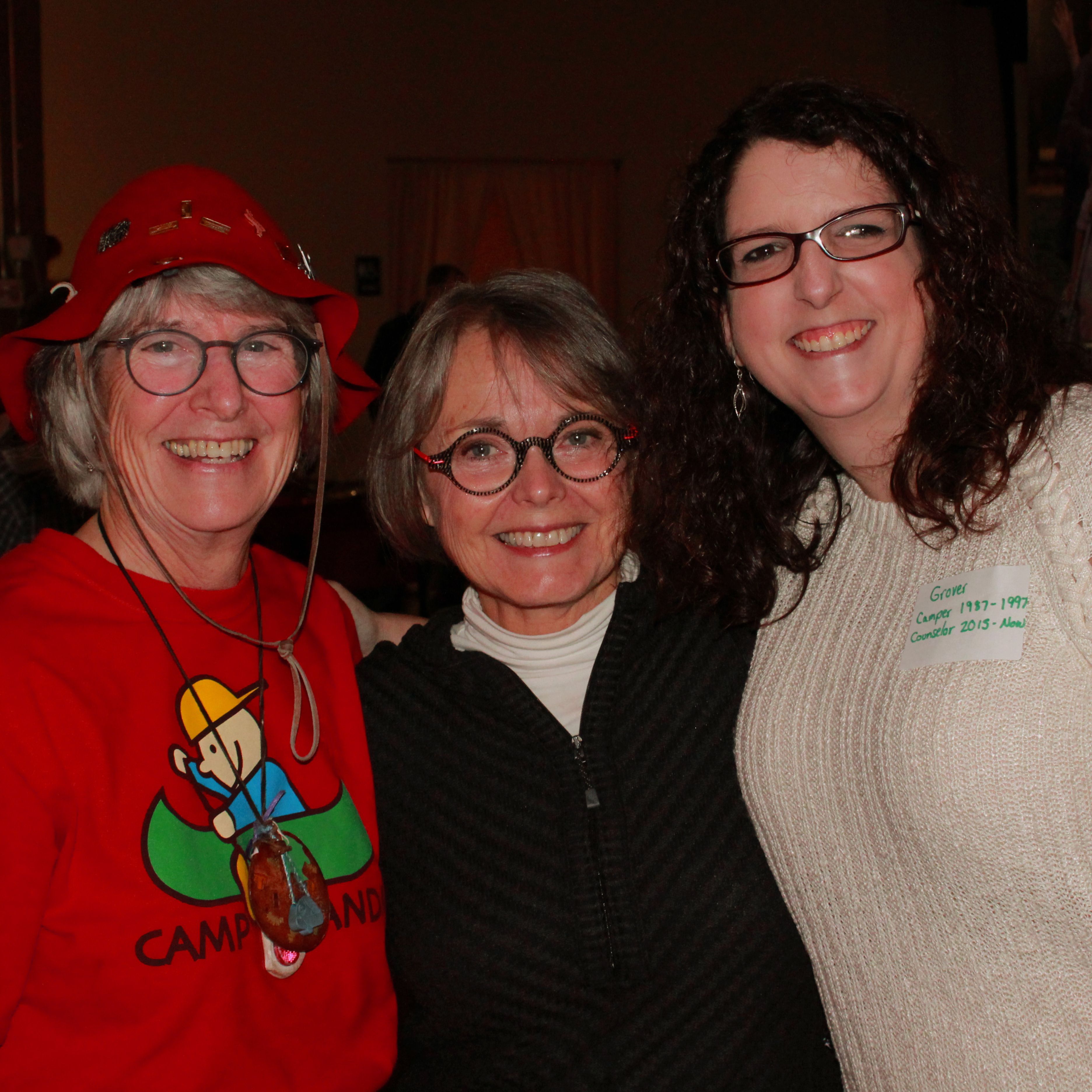 smiling volunteers at family reunion