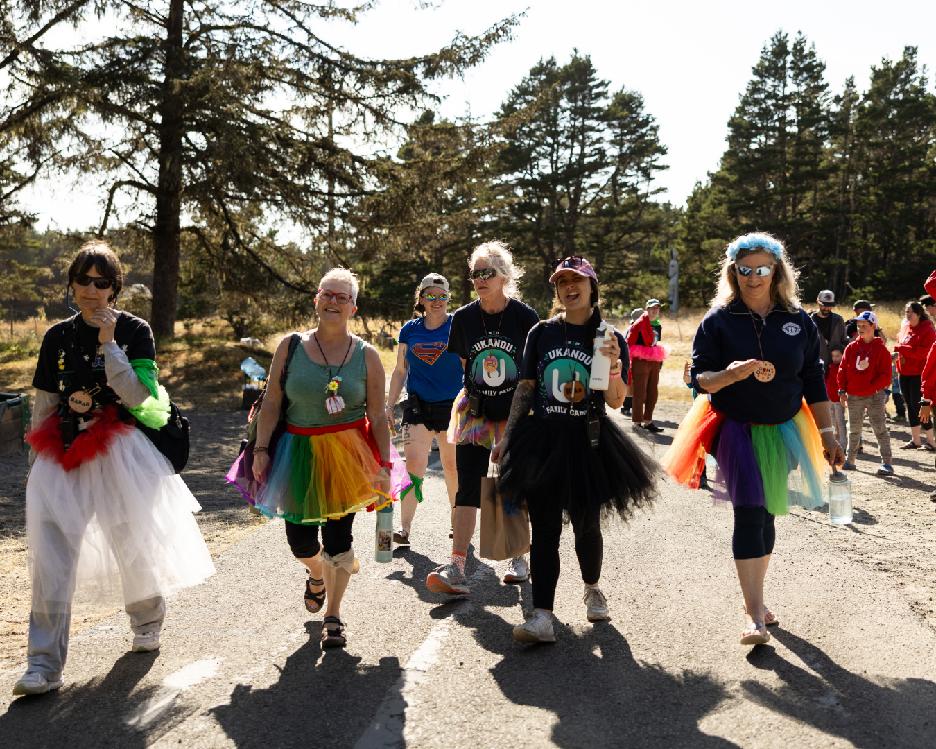 A group of volunteers walking towards the camera