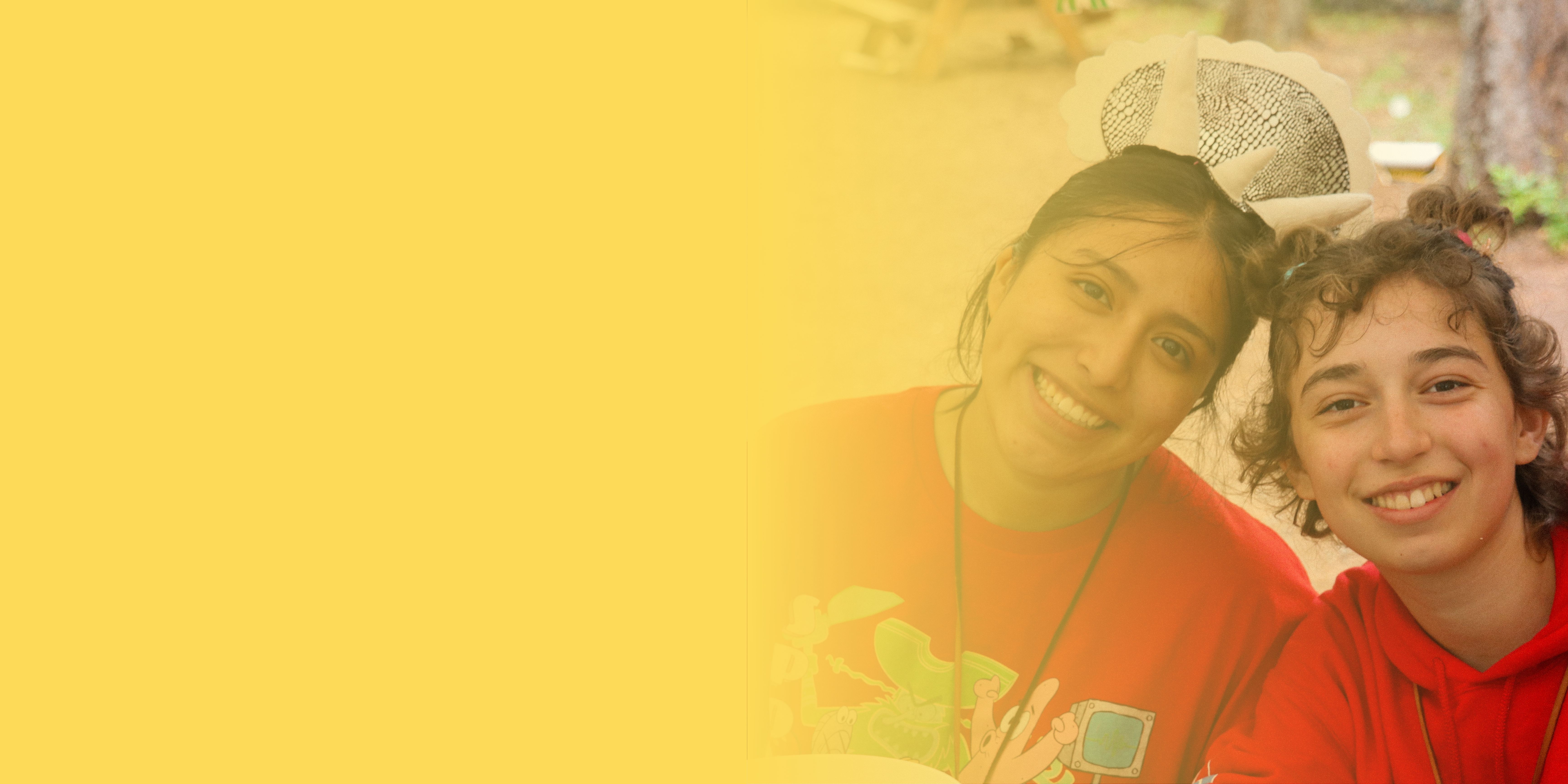 Photo of volunteer with camper and ombre yellow overlay